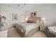 King sized bed, large windows and en-suite bathroom access at 5480 Sea Edge Dr, Punta Gorda, FL 33950