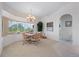 Bright dining area with table and chairs and a view at 5480 Sea Edge Dr, Punta Gorda, FL 33950