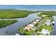Aerial view of waterfront property with private dock and boat slip at 5480 Sea Edge Dr, Punta Gorda, FL 33950