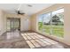 Bright living room with large windows and tile floors at 3107 Easy St, Port Charlotte, FL 33952