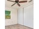 Bedroom with ceiling fan and sliding door closet at 3107 Easy St, Port Charlotte, FL 33952