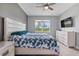Spacious bedroom with queen-size bed and window views at 43614 Sparrow Dr, Punta Gorda, FL 33982