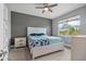 Bright bedroom with a queen-size bed and large window at 43614 Sparrow Dr, Punta Gorda, FL 33982