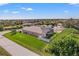 Single-story home with pool, screened enclosure, and spacious backyard at 14176 Saul Ln, Port Charlotte, FL 33981