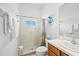 Bathroom with shower and vanity at 14176 Saul Ln, Port Charlotte, FL 33981