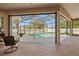 Relaxing pool and patio area with screened enclosure at 14176 Saul Ln, Port Charlotte, FL 33981