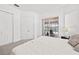 Bedroom with king-size bed and pool view at 14176 Saul Ln, Port Charlotte, FL 33981