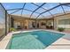 Inviting screened pool with ample deck space at 14176 Saul Ln, Port Charlotte, FL 33981