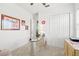 Home office with built-in desk and double door closet at 14176 Saul Ln, Port Charlotte, FL 33981