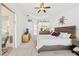 Main bedroom with king-size bed and access to backyard at 14176 Saul Ln, Port Charlotte, FL 33981