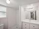 Modern bathroom with white subway tile and vanity at 1642 Banyan Dr, Venice, FL 34293