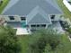Aerial view showing house, patio, and backyard at 3721 Monday Ter, North Port, FL 34286