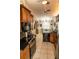 Spacious kitchen, granite counters, wood cabinets, and a breakfast bar at 3721 Monday Ter, North Port, FL 34286