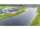 Aerial view of homes situated along a peaceful lake at 1781 W Palms Dr, Port Charlotte, FL 33953