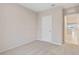 Bedroom with access to the kitchen at 1781 W Palms Dr, Port Charlotte, FL 33953