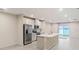 Modern kitchen with stainless steel appliances and water view at 1781 W Palms Dr, Port Charlotte, FL 33953