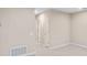 Hallway with light walls and tile flooring at 1781 W Palms Dr, Port Charlotte, FL 33953