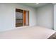 Covered patio with sliding glass doors leading to the interior at 1781 W Palms Dr, Port Charlotte, FL 33953
