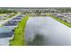 Aerial view of homes with lake access, showcasing waterfront properties at 1781 W Palms Dr, Port Charlotte, FL 33953