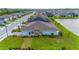 Single-story home with backyard and lake view at 1781 W Palms Dr, Port Charlotte, FL 33953