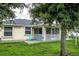 Spacious backyard with grassy area and patio at 3721 Monday Ter, North Port, FL 34286