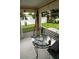 Relaxing screened porch with outdoor seating and backyard views at 3721 Monday Ter, North Port, FL 34286