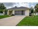 House exterior featuring a garage and driveway at 3721 Monday Ter, North Port, FL 34286