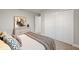 Bright bedroom with a cozy bed, large closet, and neutral decor at 13493 Los Angeles Ave, Port Charlotte, FL 33981