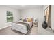 Bedroom with a queen bed and stylish decor at 13493 Los Angeles Ave, Port Charlotte, FL 33981