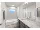 Bathroom with tub, vanity, and granite countertop at 13493 Los Angeles Ave, Port Charlotte, FL 33981