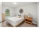 Cozy bedroom with a queen bed and neutral decor at 13493 Los Angeles Ave, Port Charlotte, FL 33981