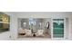 View from patio shows living room and access to backyard at 13493 Los Angeles Ave, Port Charlotte, FL 33981