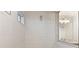Large tiled shower with frameless glass enclosure at 13493 Los Angeles Ave, Port Charlotte, FL 33981