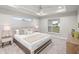 Main bedroom with large window and neutral color scheme, carpeted floor at 13493 Los Angeles Ave, Port Charlotte, FL 33981