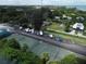 Aerial view of tennis courts and boat storage at 25188 Marion Ave # D101, Punta Gorda, FL 33950