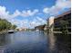 Waterfront community with boats and lush landscaping at 25188 Marion Ave # D101, Punta Gorda, FL 33950