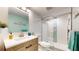 Updated bathroom with walk-in shower and modern vanity at 25188 Marion Ave # D101, Punta Gorda, FL 33950
