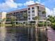 Building with balconies overlooking the canal at 25188 Marion Ave # D101, Punta Gorda, FL 33950