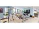 Relaxing living room featuring a large TV and sectional sofa at 25188 Marion Ave # D101, Punta Gorda, FL 33950