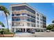 Building exterior with parking and landscaping at 25188 Marion Ave # D101, Punta Gorda, FL 33950