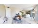 Spacious home office with built-in workspace and view into living room at 25188 Marion Ave # D101, Punta Gorda, FL 33950