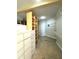 Large walk-in Primary closet with ample shelving and drawers at 1185 Bayshore Dr, Englewood, FL 34223