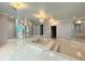 Primary bathroom with large soaking tub and separate shower at 1185 Bayshore Dr, Englewood, FL 34223