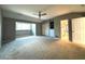 Large main bedroom with ample closet space and carpet flooring at 1185 Bayshore Dr, Englewood, FL 34223