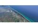 Aerial view showing home's location near water at 1185 Bayshore Dr, Englewood, FL 34223