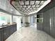 Updated kitchen featuring stainless steel appliances and granite countertops at 1185 Bayshore Dr, Englewood, FL 34223