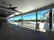 Spacious covered patio overlooking the water at 1185 Bayshore Dr, Englewood, FL 34223