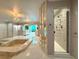 Bathroom with a large walk-in shower and soaking tub at 1185 Bayshore Dr, Englewood, FL 34223