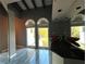 Bathroom with double sinks, large windows, and modern finishes at 1185 Bayshore Dr, Englewood, FL 34223