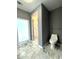 Clean bathroom with a large shower and window at 1185 Bayshore Dr, Englewood, FL 34223